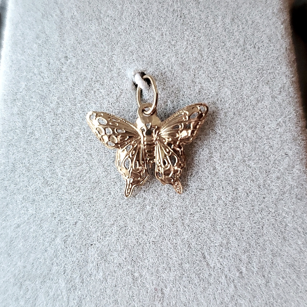 Tiny butterfly pendant